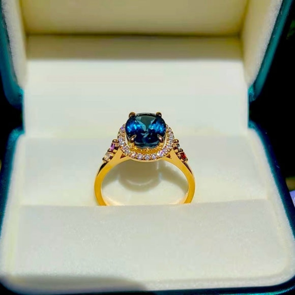 Solid 14k gold 3ct oval topaz ring with side birth stone